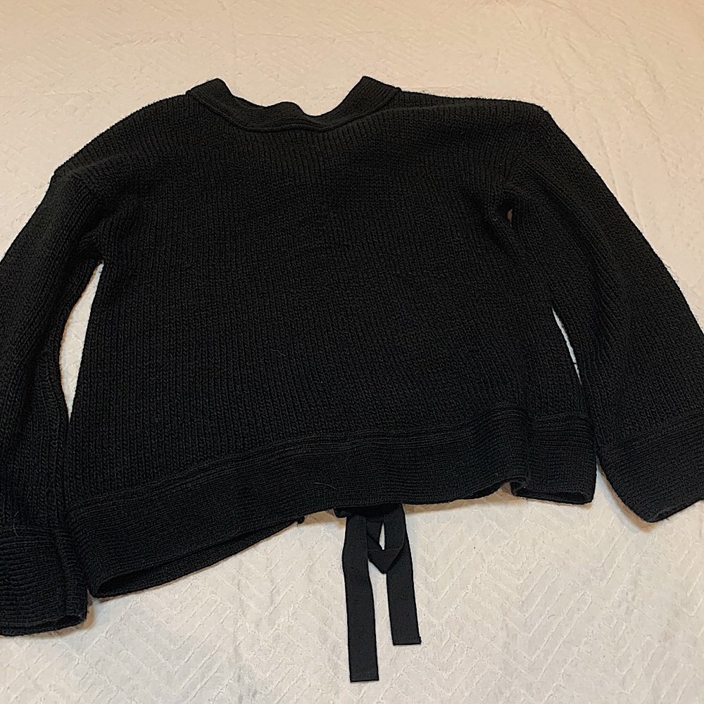 black sweater with tie detail